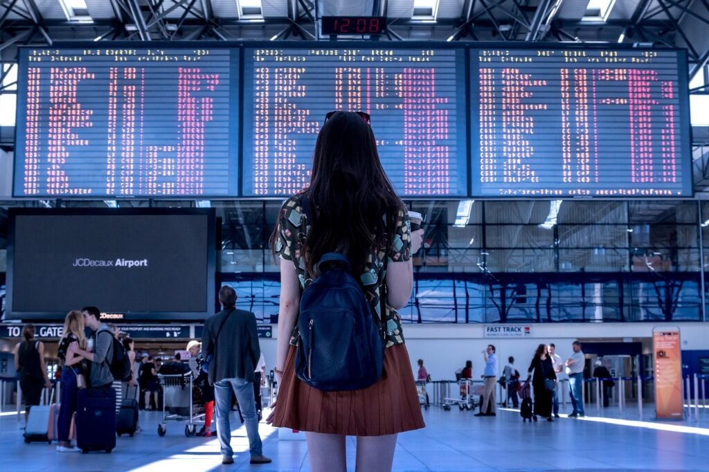 woman traveling at airport summer as a teacher